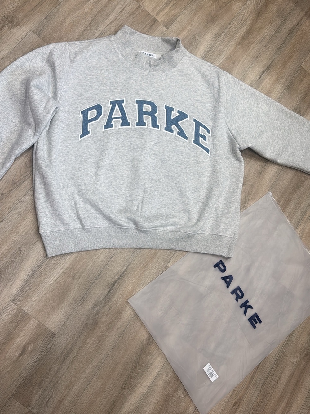 Brand new Parke denim and grey mock neck L/XL